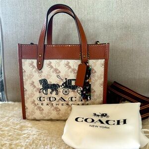 Coach Field Tote 22 with Horse and Carriage print.